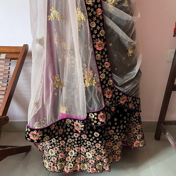 Grand Wine Coloured Lehenga Embellished with Pink and Gold Embroidered Flowers - Picture 8 of 17